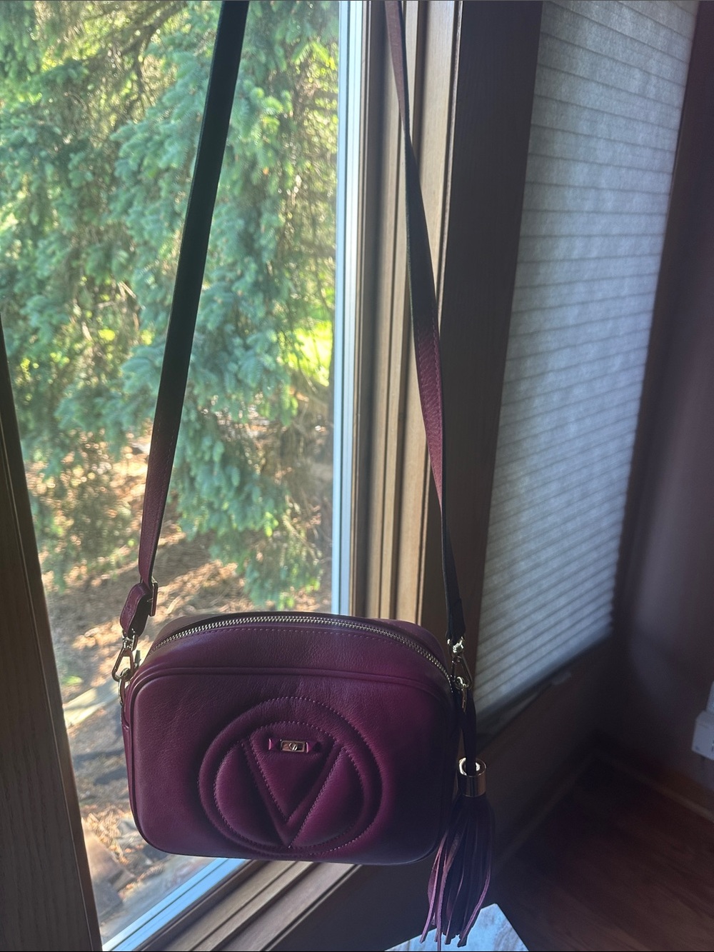 Valentino by Mario Valentino Leather Crossbody Bag .Tassel charm. Magenta color